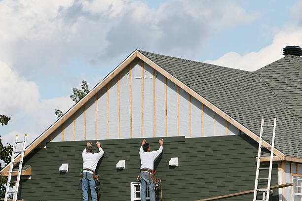 Professional Siding technician working in Greensburg, IN
